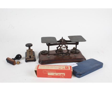 Early 20th Century postage scales, including weights, together with a patented stapler, signature stamp and a cased set of dr