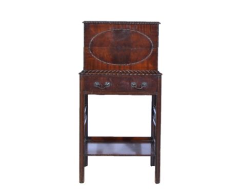 Mahogany gramophone cabinet on stand, hinged lid, drawer under, the moulded legs joined by a shelf, width 45cm x depth38cm x 