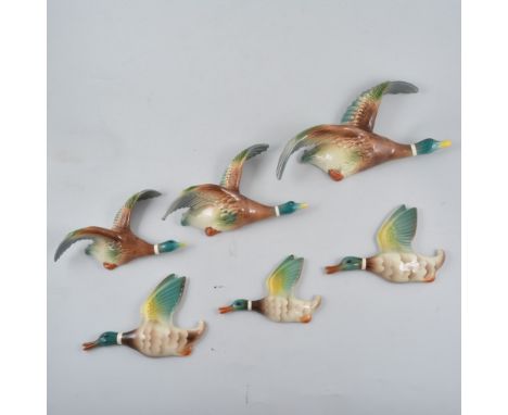 Beswick novelty cruet of Laurel & Hardy, 11cm, a Goebel group, cat musician and two sets of three Mallard wall ornaments, (9)