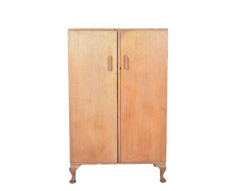 Light oak tallboy, plain rectangular form, the interior fitted with slides and drawers, two doors, short cabriole legs, W76cm