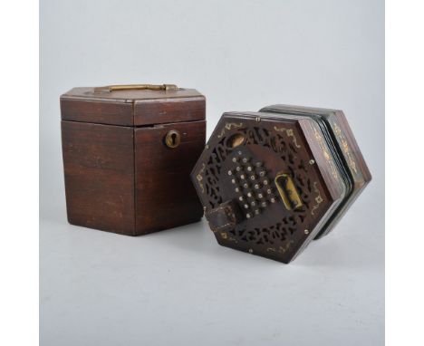 A Lachanel & Co Patent Concertina the hexagonal fret-cut rose wood ends with forty-eight buttons (twenty-four to each), backe
