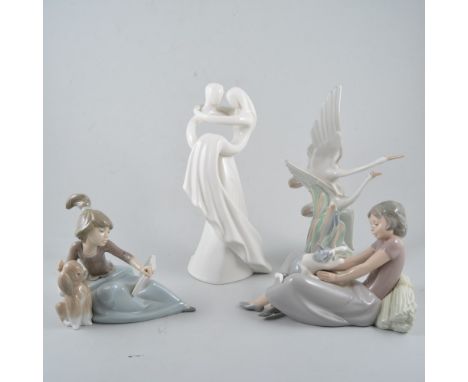 Nine Nao/ Lladro figures including a Circle of Love figure "Infinite Love", the Lladro figure being a girl with a puppy dog, 
