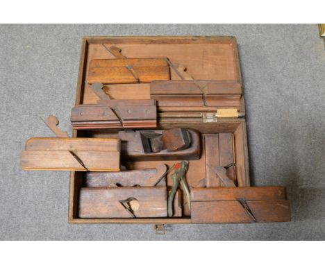 Collection of carpenters moulding planes and ammunition box.