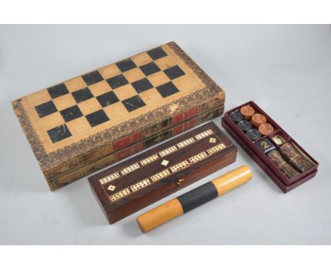 Folding Backgammon set, together with a Cribbage Board, together with a Travelling Chess set.