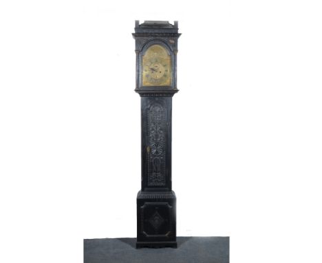 Oak longcase clock, hood with moulded cornice, turned and fluted three-quarter columns, long arched door, bracket feet, carve