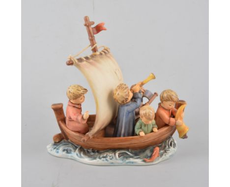 A Goebel Hummel figure group "Land In Sight" with certificate number 27763 of 30,000, boxed, two boxed anniversary plates 197