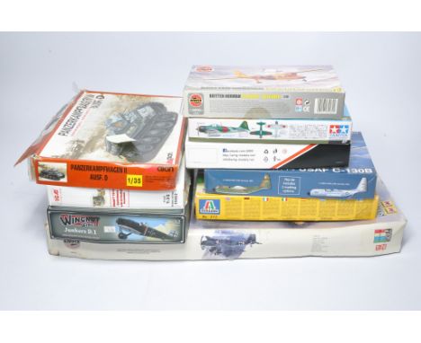 A group of Plastic Model Kits from various makers to include Airfix Junkers Ju87B-2 Stuka 1/24, Tamiya Mitsubishi AGM5.c Zero