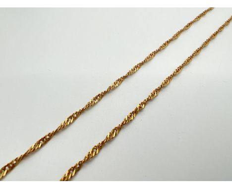 A 28 inch 18ct gold Singapore style chain necklace with Spring ring clasp. Worn marks to clasp. Total weight approx. 11.7g. 