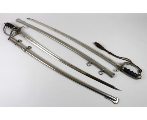 Two US Army model 1904 dress swords, blade lengths 81 and 80cm, the latter with wooden grip, the blade by H V Allien and Co, 