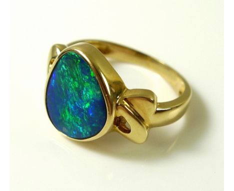 A vintage black opal and 14ct gold ring, unmarked, opal 9 by 12mm, 3.5g.