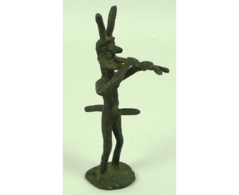A 20th century rudimentary bronze figure of Pan, possibly playing an aulos, 18cm.
