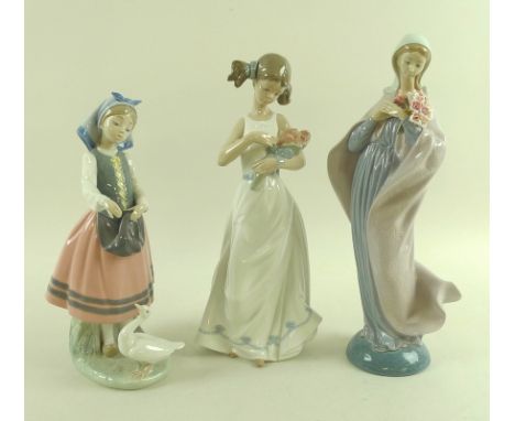 Two Lladro figures, one 'Our Lady with Flowers', 5171, the other 'Josefa Feeding Her Duck', 5201, together with a Nao figure 