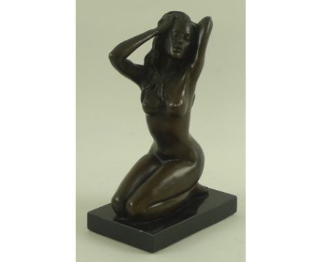 Milo (Portuguese b. 1955): a bronze figure, modelled as a female nude kneeling, on a marble base, signed Milo, 20cm. 