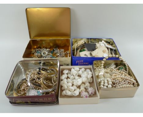 A large group of vintage and costume jewellery, including silver jewellery, earrings, brooches, necklaces, a Mexico silver an