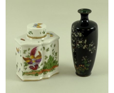 A 19th century porcelain tea caddy, the shaped body painted with exotically plumed birds and foliage, the shoulders, sides an