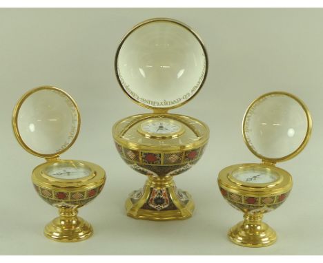 A Royal Crown Derby globe pattern clock garniture, 17.5cm, complete with clock, compass and barometer, in the Imari 1128 patt