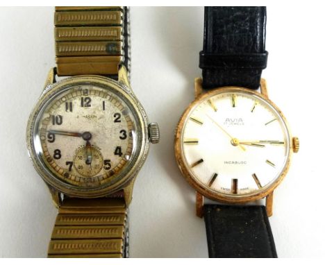 A Timor WWII military steel cased wristwatch, circular dial with Arabic numerals and subsidiary seconds dial, case back engra