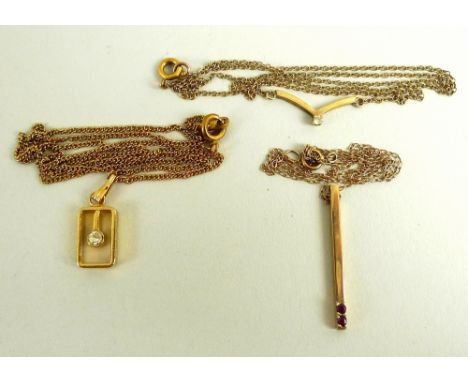 Two 9ct gold necklaces, one diamond set, the other ruby set, both hallmarked, 3.2g total weight, together with a third unmark