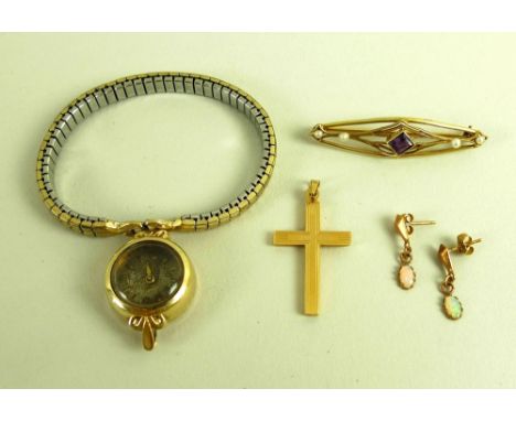 A group of 14ct gold jewellery including an amethyst and seed pearl brooch, cross, a pair of opal drop earrings and a wrist w