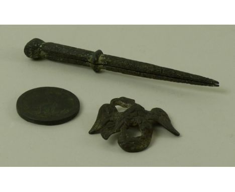 A pair of Roman bronze navigation dividers, 12cm long, a cast bronze eagle brooch, 4.5cm, and a George III cartwheel penny, 1