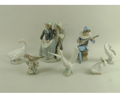 A collection of Lladro and Nao figurines comprising Lladro figure 'Boy Meets Girl', 1188, Nao figure 'Strumming', 1078, Lladr