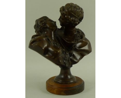 In the manner of J. A. Houdon (1741-1828): a 20th century bronze of lovers kissing, with the name J .A. Houdan inscribed vers