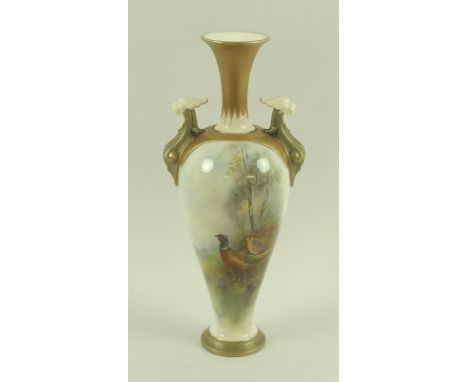 A Royal Worcester blush ivory porcelain vase of baluster form twin handled form, moulded with griffin heads to the handles, w