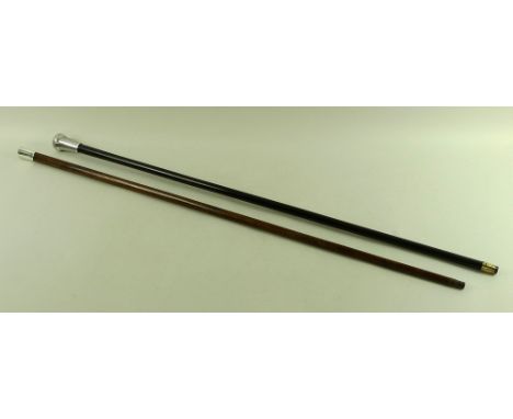 Two silver topped canes, one of unusual triangular form, the silver top engraved ' Michael Tapper, 10 Melina Place NW', Londo