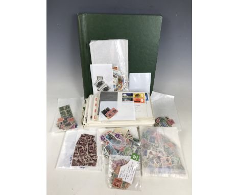 Approximately sixty GB first day covers together with sundry packets of stamps and a Springback album
