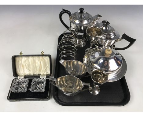 A quantity of electroplate, including a three-piece tea service, a muffin dish, a toast rack, and a cased pair of cut-glass s