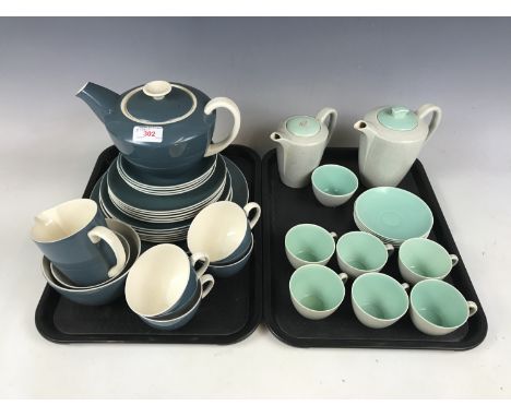 Two Poole Pottery tea services (teapot and water pot a/f)