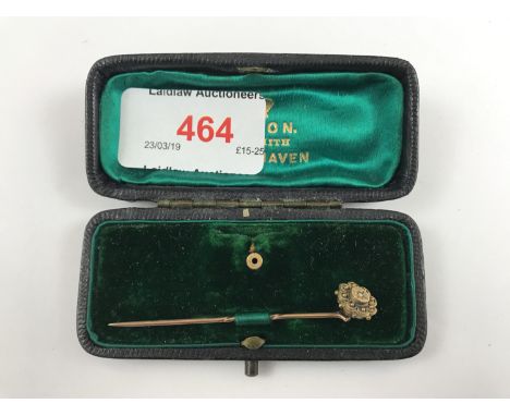 A Victorian yellow-metal convertible stick pin / shirt stud set with a solitaire diamond chip, in fitted case 