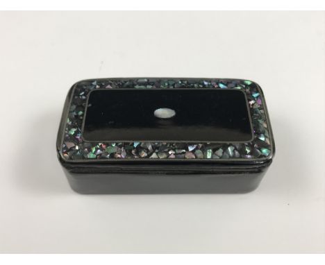 A 19th Century black lacquered and abalone inlaid snuff box