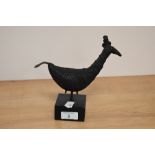 A 19th Century cast metal Indian peahen study, raised on a wooden base of square section and
