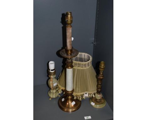 A 20th Century French style table lamp, with fluted column and polished metal base, measuring 65cm high, together with two on
