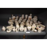 A selection of Goss crested ware trinkets and miniature vases, place names include Margate,