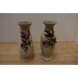 A pair of attractive 20th Century stoneware vases, having applied lizard decoration, each