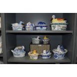 An assorted collection of 19th and 20th Century lidded tureens and hens on nests, to include a