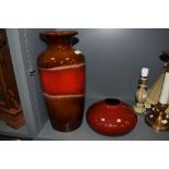 A 1970s West German pottery vase, 202-43, having a red banded design and measuring 44cm high, and