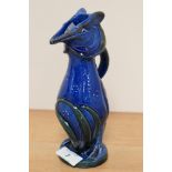 C.H. Brannam, an art pottery jug modelled as a grotesque bird and covered in a blue/green glaze,