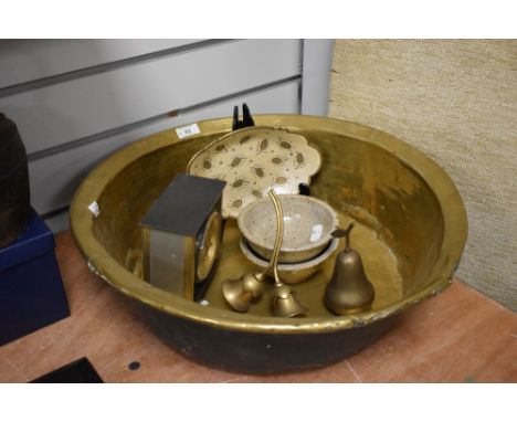 A large 19th Century brass coloured cream pan, measuring 48cm in diameter, and other metal ware including an Indian brass and