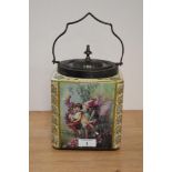 An early 20th Century Carlton Fantasia Ware biscuit barrel, having a white metal lid and handle,
