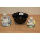 Two 19th/20th Century hand painted seated Buddha studies, the largest measures 9cm high, and a tea