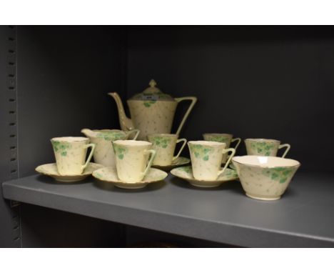 A Grafton china coffee set, the design featuring hand painted green petalled flowers, comprising coffee pot, cream jug, sucri