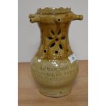 A 19th Century stoneware glazed puzzle jug by John Lee of Lanshaw, Tatham, measuring 21cm high