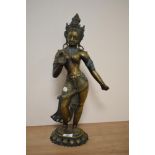 An early 20th Century Indian brass statue depicting the Goddess Tara Parvati, having intricately