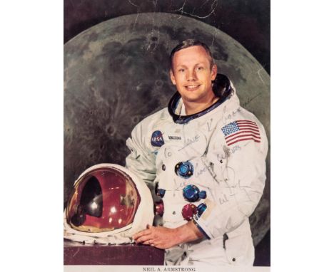 A famous10 x 8" colour NASA photograph of Neil Armstrong in space suit with... A famous10 x 8" colour NASA photograph of Neil