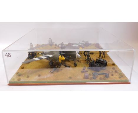 A diorama of P30, 1:32 scale, in Perspex case.