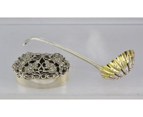 HENRY HOLLAND A SILVER SUGAR SIFTING LADLE with gilded bowl and scroll terminal handle, London 1874, together with a decorati