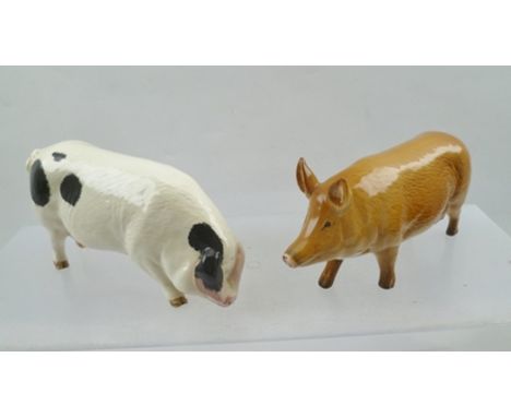 A ROYAL DOULTON CERAMIC MODEL OF A GLOUCESTER OLD SPOT SOW 14cm and another of a TAMWORTH SOW 15cm, each with original box 